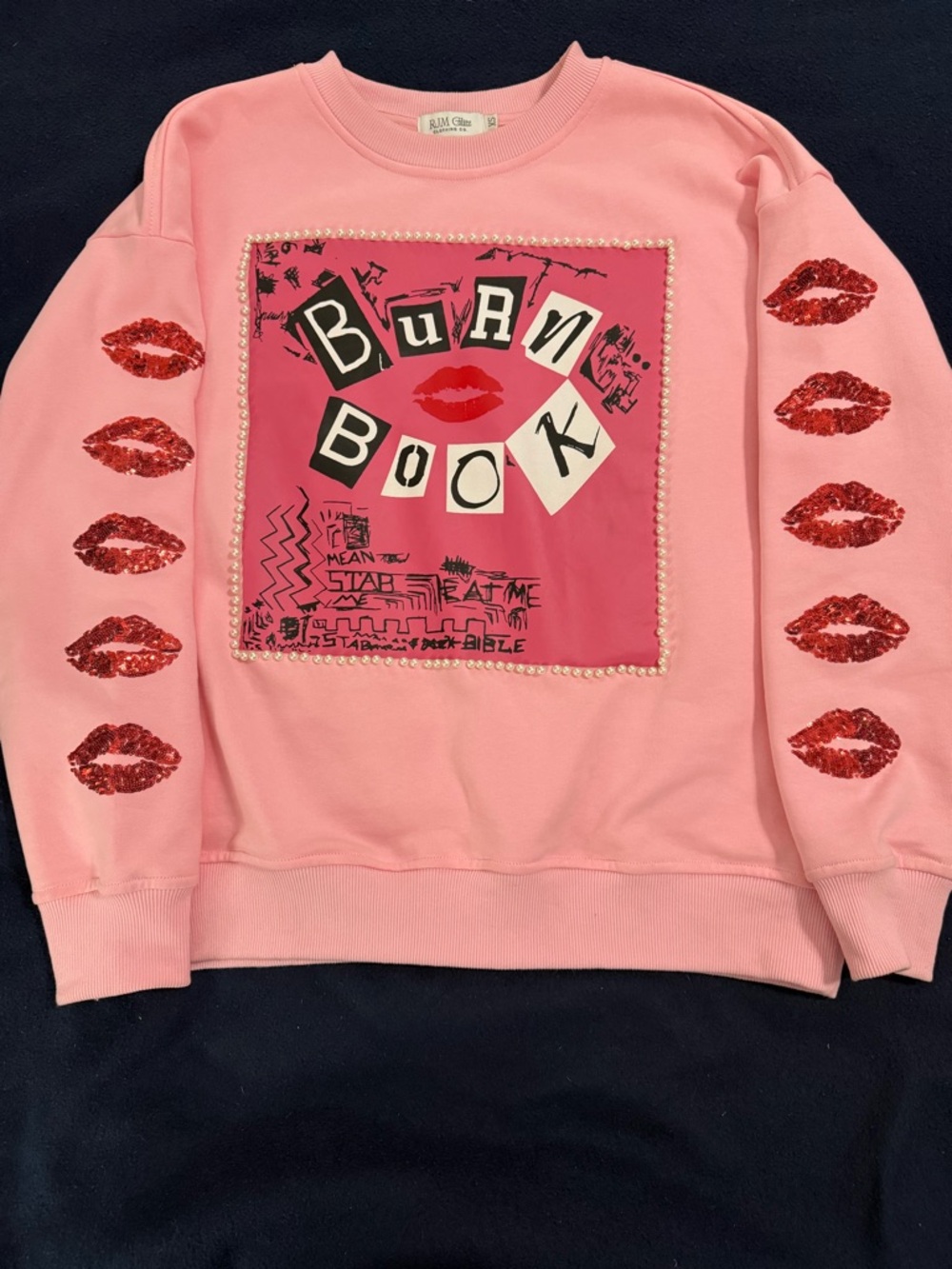 Women's Pink 'Burn Book' Graphic Crewneck Sweatshirt - Sequin Lip Detail